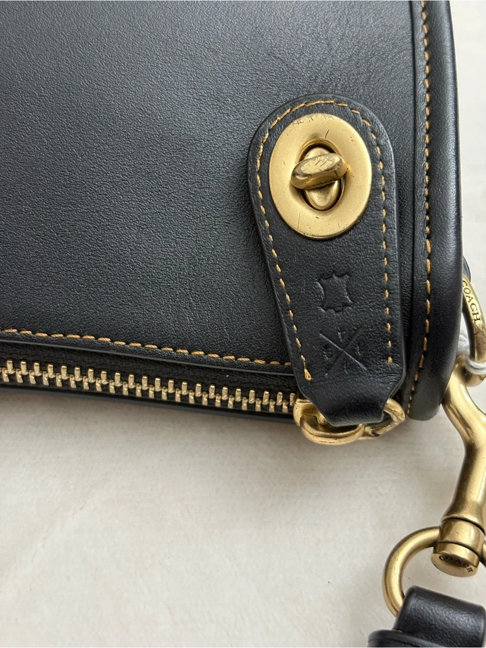 Coach Black Swinger Glove-Tanned Leather Crossbody Bag.